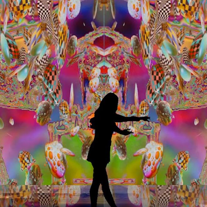 Silhouette of a woman in front of a psychedelic background